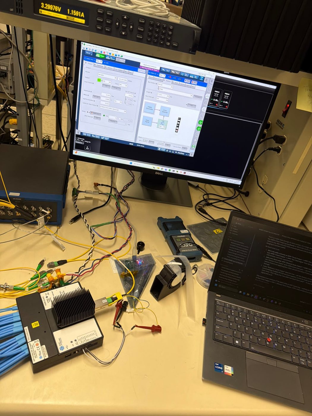 Semtech lab bench with monitor, evaluation boards and test cabling